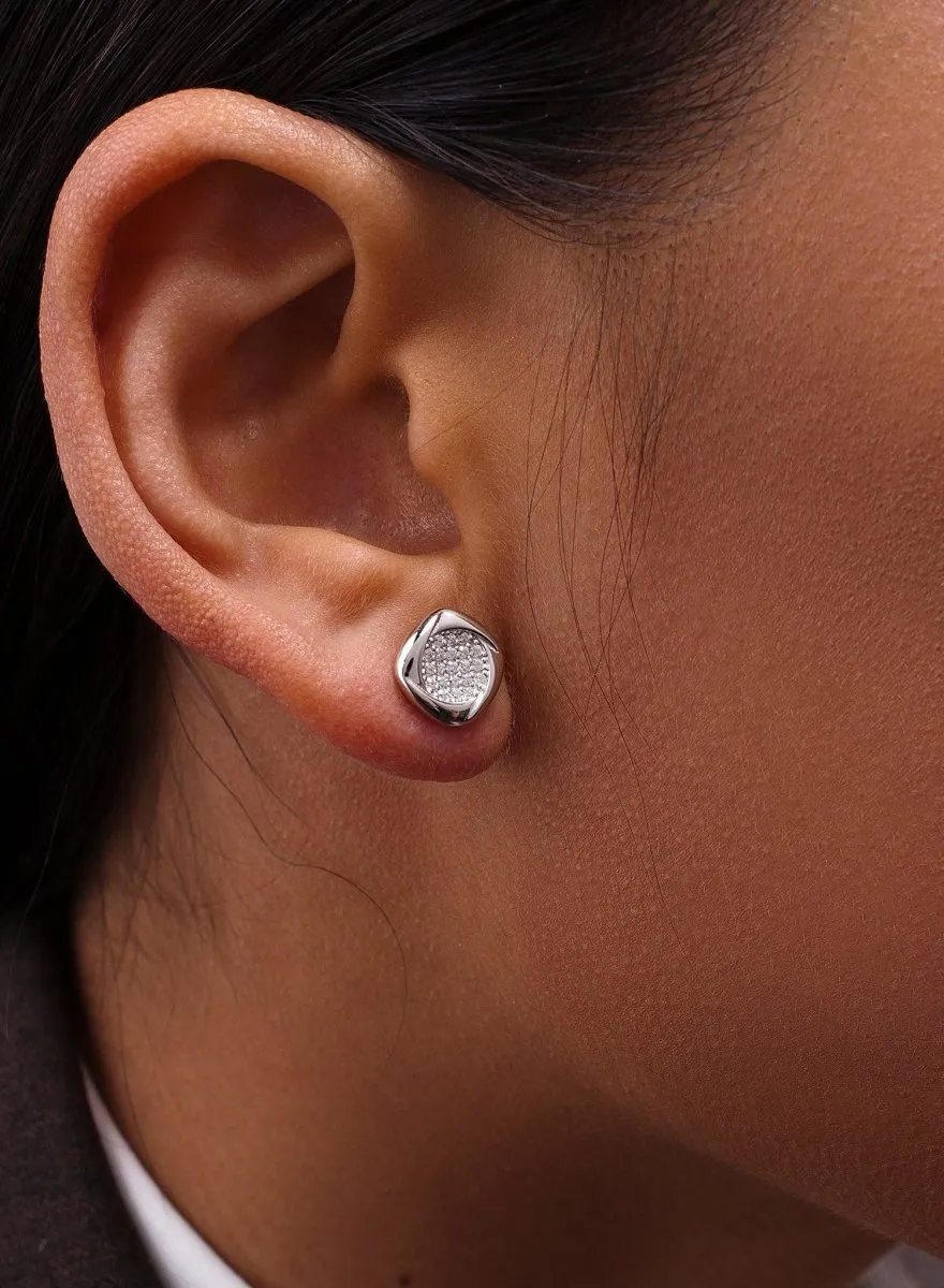 Pendientes pequeos plata brillantes con silueta circular y circonitas